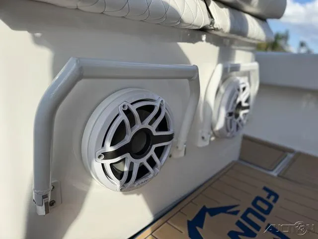 Slide: The Image of 2023 Fountain 34 CC boat speakers and deck detail. - 38