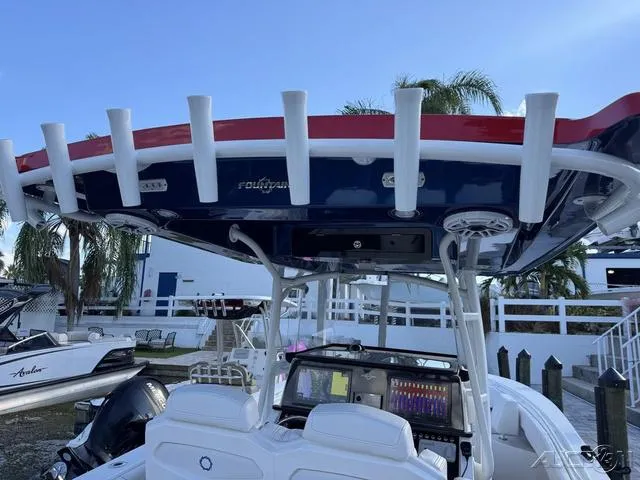 Slide: The Image of 2023 Fountain 34 CC boat with advanced navigation system and sleek design. - 43