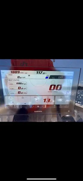 Slide: The Image of Garmin display on 2023 Sportsman 231 Heritage boat showing navigation data. - 12