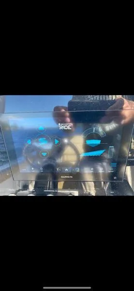 Slide: The Image of Close-up of 2023 Sportsman 231 Heritage boat dashboard with digital display. - 14