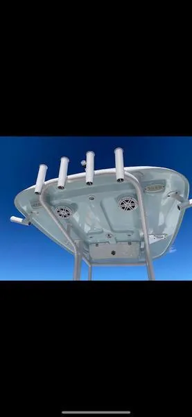 Slide: The Image of 2023 Sportsman 231 Heritage boat top with rod holders and speakers. - 6