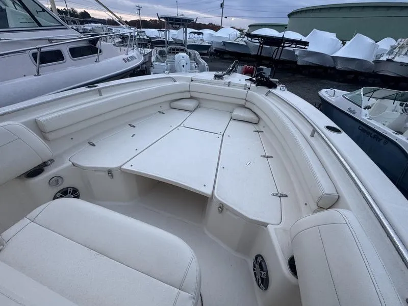 Slide: The Image of 2022 Grady-White 257 Fisherman boat interior with spacious seating and storage. - 12