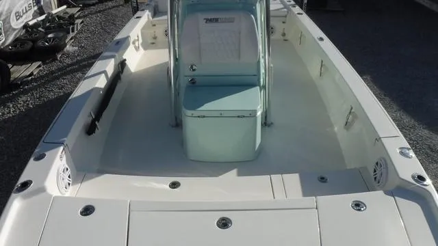 Slide: The Image of 2025 Pathfinder 2500 Hybrid boat interior, featuring spacious deck and seating. - 16