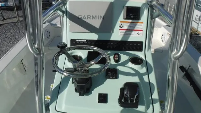 Slide: The Image of 2025 Pathfinder 2500 Hybrid boat console with Garmin navigation system. - 24