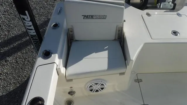 Slide: The Image of 2025 Pathfinder 2500 Hybrid boat seat with speaker and rod holders. - 25
