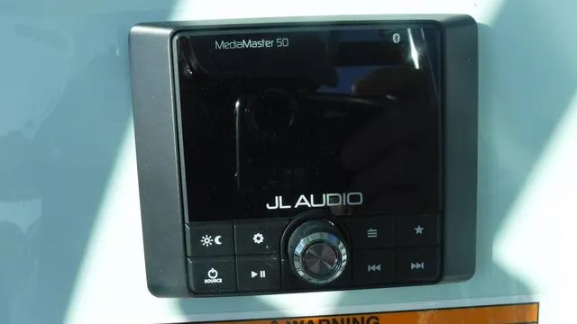 Slide: The Image of JL Audio MediaMaster 50 control panel in 2025 Pathfinder 2500 Hybrid. - 31