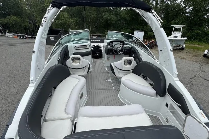 Slide: The Image of 2020 Crownline Eclipse E255 boat interior with spacious seating and modern design. - 4