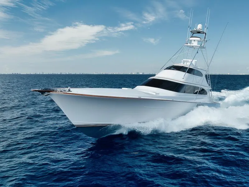 Slide: The Image of Luxury Merritt 86' Enclosed Flybridge yacht cruising on open sea, 2016 model. - 11