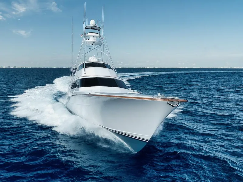 Slide: The Image of Luxurious 2016 Merritt 86' Enclosed Flybridge yacht cruising on open sea. - 12