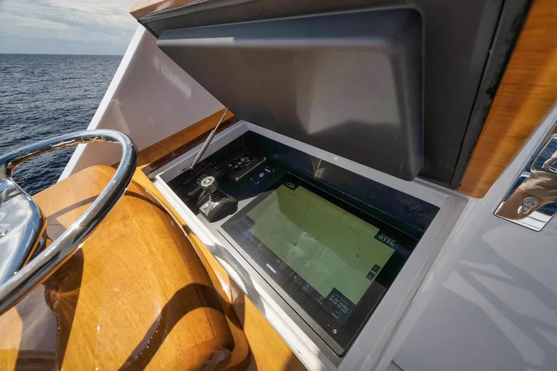 Slide: The Image of Control panel of 2016 Merritt 86' Enclosed Flybridge yacht with navigation display. - 22