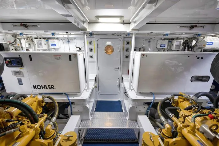 Slide: The Image of Engine room of 2016 Merritt 86' Enclosed Flybridge yacht with Kohler generators. - 29