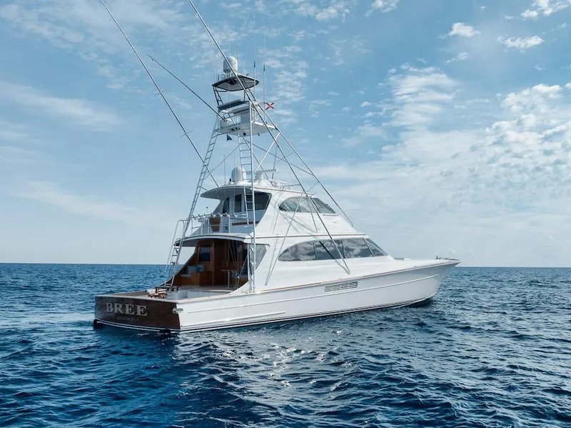 Slide: The Image of 2016 Merritt 86' Enclosed Flybridge yacht on open sea under blue sky. - 3