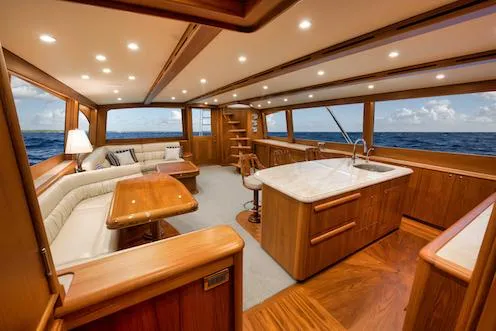 Slide: The Image of Luxurious interior of 2016 Merritt 86' Enclosed Flybridge yacht with wood finishes and ocean view. - 39