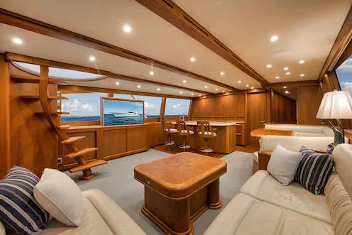 Slide: The Image of Luxurious interior of 2016 Merritt 86' Enclosed Flybridge yacht with elegant wood finishes. - 41