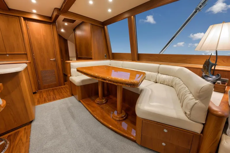 Slide: The Image of Luxurious interior of 2016 Merritt 86' Enclosed Flybridge yacht with elegant wood finishes. - 42