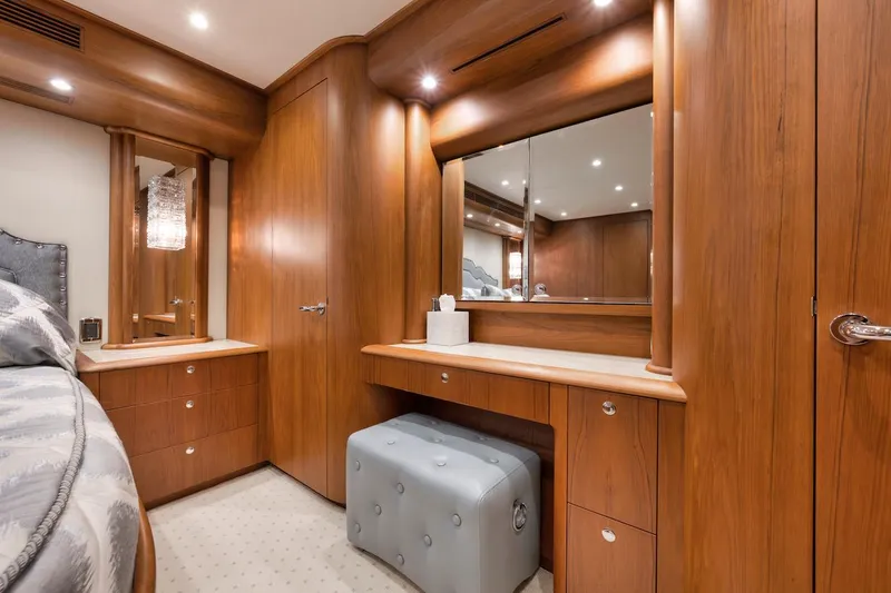 Slide: The Image of Luxurious interior of 2016 Merritt 86' Enclosed Flybridge yacht with elegant wood finish. - 48