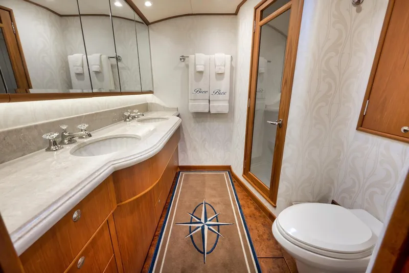 Slide: The Image of Luxurious bathroom in 2016 Merritt 86' Enclosed Flybridge yacht with elegant fixtures. - 49