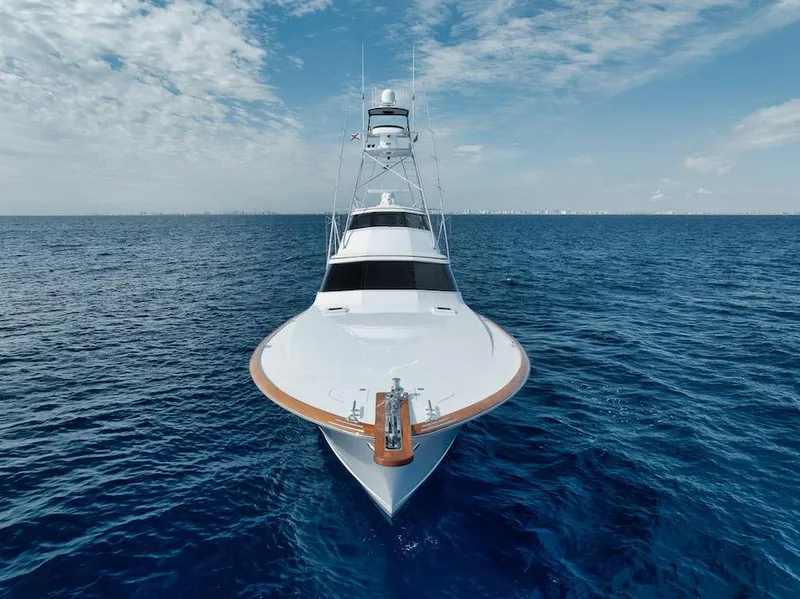Slide: The Image of Merritt 86' Enclosed Flybridge yacht, 2016 model, cruising on open ocean under blue sky. - 8