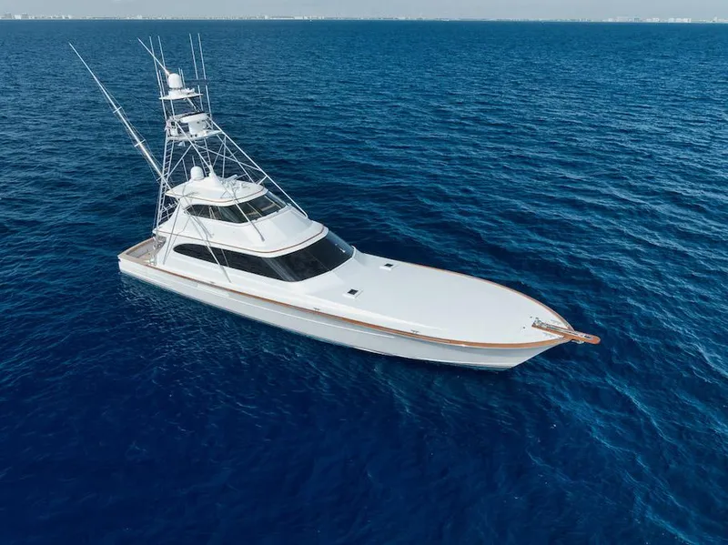 Slide: The Image of Luxury 2016 Merritt 86' Enclosed Flybridge yacht cruising on open sea. - 9