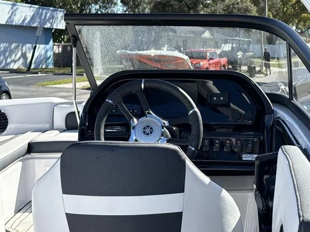 Slide: The Image of 2025 Yamaha Boats 195S-MIST GRAY-GALVANIZED interior with steering wheel and dashboard. - 14