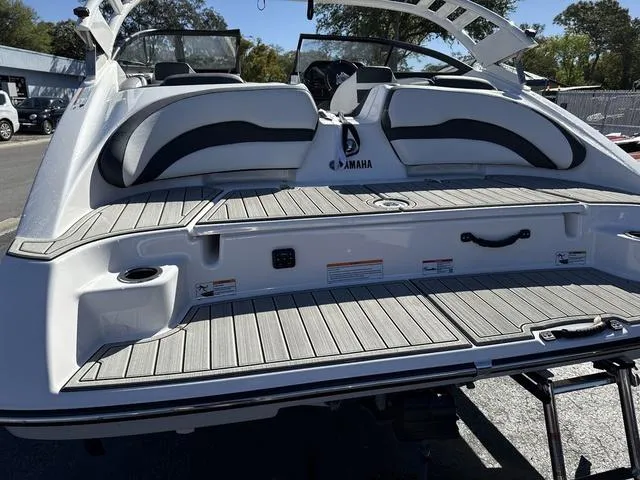 Slide: The Image of 2025 Yamaha Boats 195S, Mist Gray, sleek interior design, spacious seating, modern features. - 5