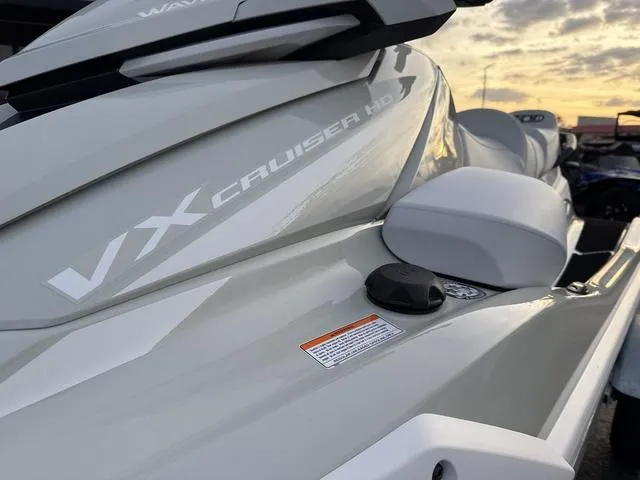 Slide: The Image of 2025 Yamaha Marine Waverunner VX Cruiser HO with Audio, sleek design, turquoise and gray color. - 4