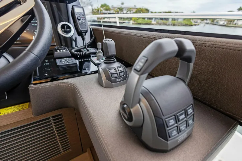 Slide: The Image of Control panel of 2022 Prestige 520 yacht with advanced navigation equipment. - 10