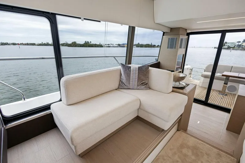 Slide: The Image of Luxurious interior of 2022 Prestige 520 yacht with waterfront view. - 12