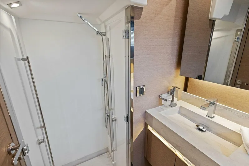 Slide: The Image of Luxurious bathroom in 2022 Prestige 520 yacht with modern fixtures and spacious shower. - 17