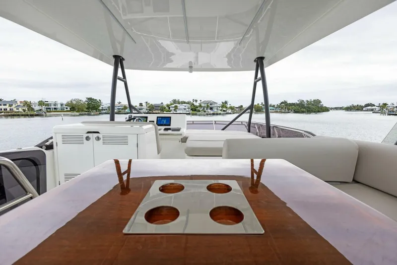 Slide: The Image of Luxurious 2022 Prestige 520 yacht interior with elegant seating and scenic water views. - 33