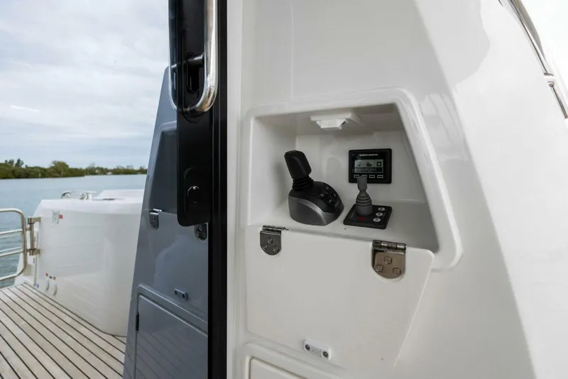 Slide: The Image of Prestige 520 yacht control panel, 2022 model, featuring sleek design and modern technology. - 36