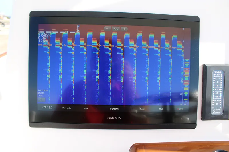 Slide: The Image of Garmin display on 2022 Front Runner 26 Center Console boat showing sonar data. - 18