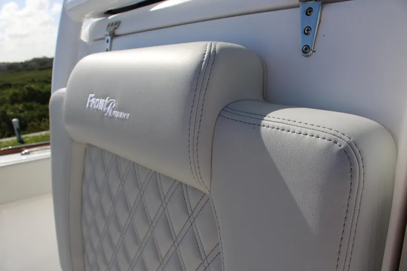 Slide: The Image of 2022 Front Runner 26 Center Console boat seat with diamond stitching detail. - 3