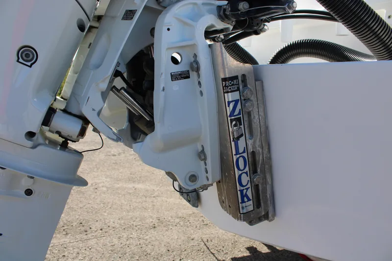 Slide: The Image of Close-up of 2022 Front Runner 26 Center Console boat engine mount with Z-Lock bracket. - 34