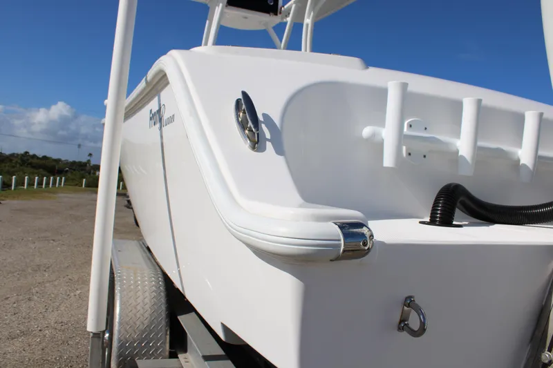 Slide: The Image of 2022 Front Runner 26 Center Console boat on trailer, side view. - 35