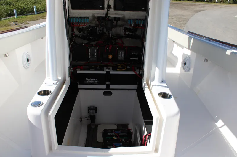Slide: The Image of 2022 Front Runner 26 Center Console boat with open electrical compartment. - 4