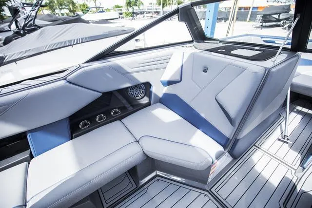 Slide: The Image of 2024 Nautique S23 boat interior with modern seating and sleek design. - 20