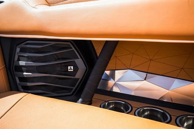 Slide: The Image of 2025 Nautique G25 interior with premium speaker and geometric design accents. - 15