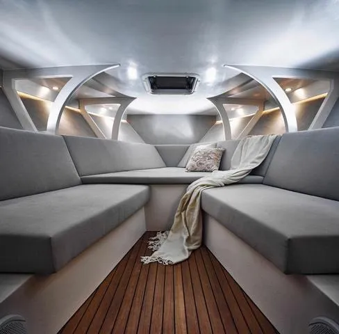 Slide: The Image of Luxurious interior of 2020 Frauscher 1017GT boat with elegant seating and wooden flooring. - 5