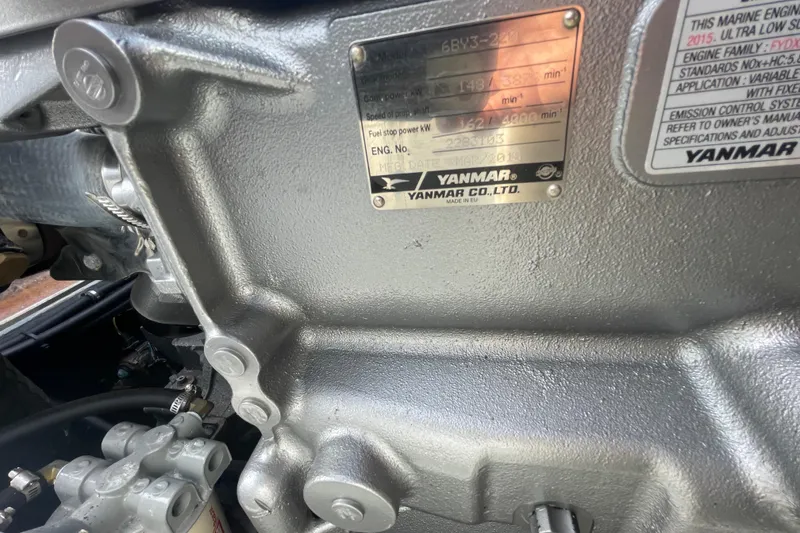 Slide: The Image of Close-up of a Yanmar engine in a 1993 Tripp Angler 22 boat. - 12