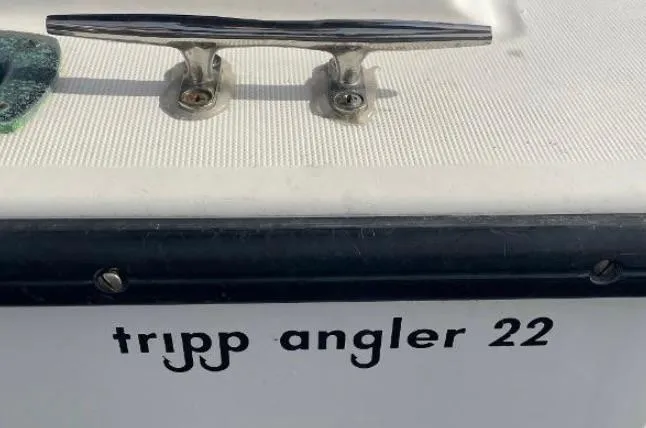 Slide: The Image of Tripp Angler 22 boat, 1993 model, featuring a cleat on the deck. - 3