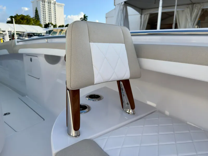 Slide: The Image of 2025 Mag Bay 38 CC boat interior with elegant seating and modern design. - 16