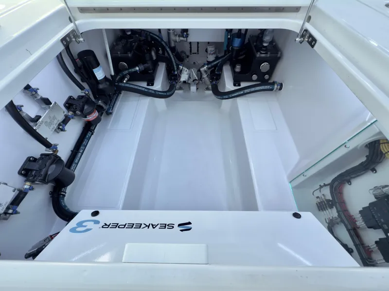 Slide: The Image of Engine compartment of 2025 Mag Bay 38 CC boat with Seakeeper 3 stabilizer. - 21