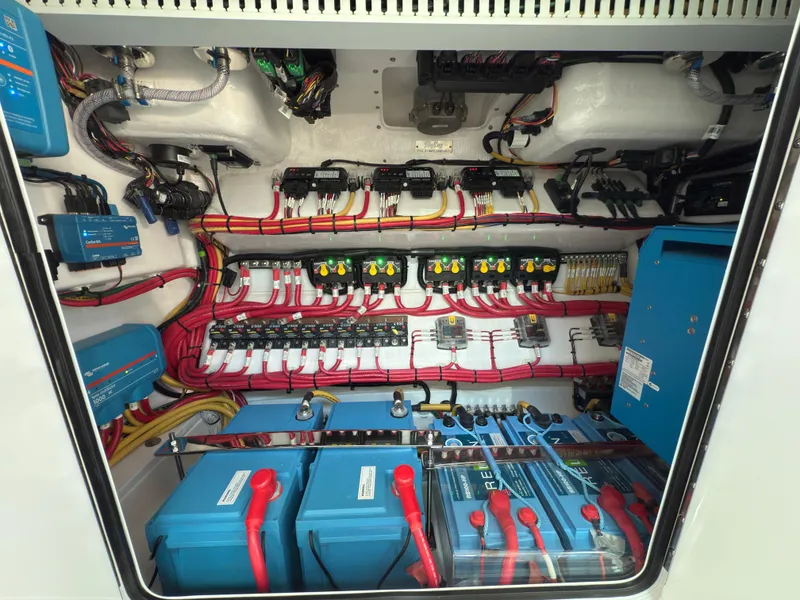 Slide: The Image of Electrical system of 2025 Mag Bay 38 CC boat, featuring batteries and wiring. - 8