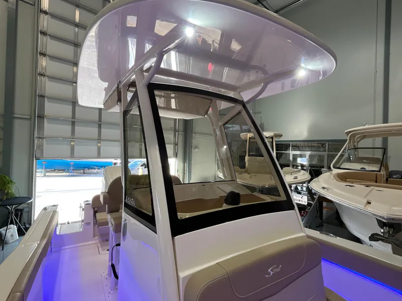 Slide: The Image of 2025 Scout 240 XSF boat interior with modern design and lighting. - 11