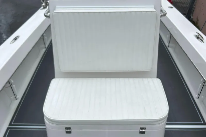 Slide: The Image of 2023 Jones Brothers 23 Cape Fisherman boat seating with white cushions. - 18