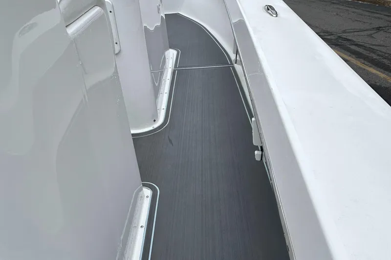 Slide: The Image of 2023 Jones Brothers 23 Cape Fisherman boat deck, sleek design, non-slip surface. - 22