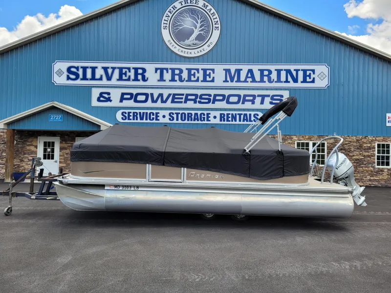 Slide: The Image of 2022 Premier 220 Sunspree RF pontoon boat at Silver Tree Marine dealership. - 12