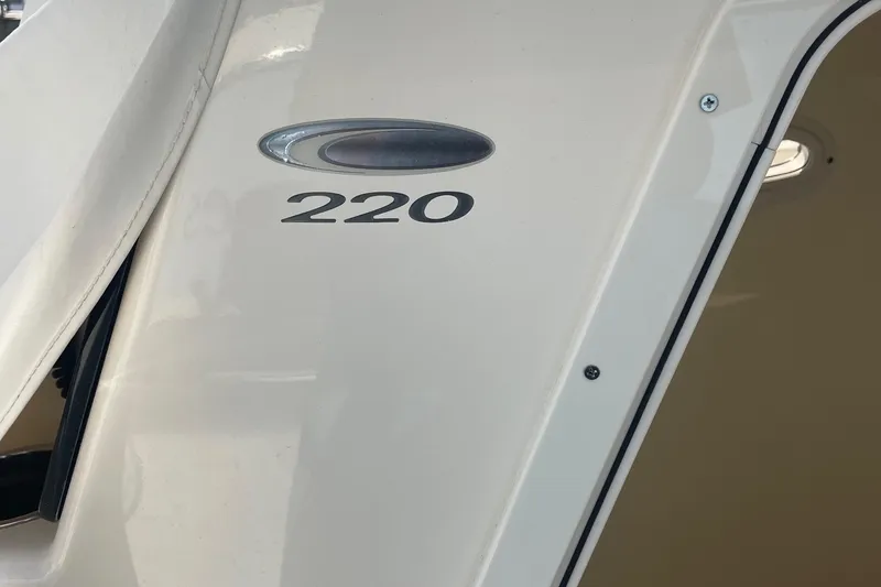 Slide: The Image of 2022 Cobia 220 Center Console boat exterior detail. - 13