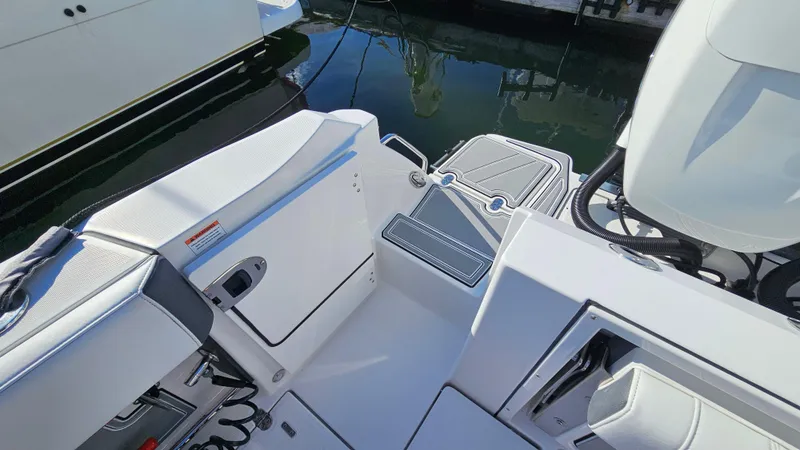 Slide: The Image of 2021 Blackfin 332 CC boat deck with seating and storage compartments. - 15